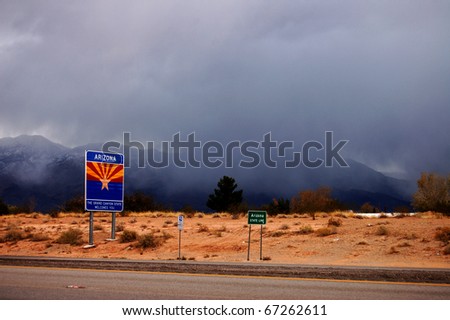 Low storm clouds rolling in off the mountains at the Arizona-Nevada border