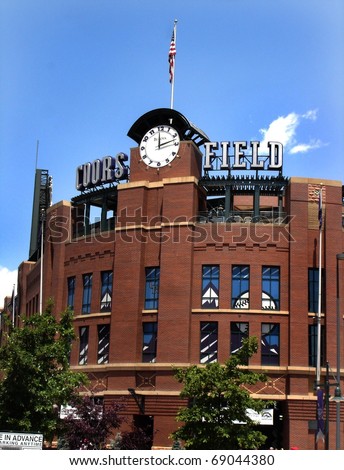 DENVER - JUNE 29: Coors Field, with its hand-laid brick facade and clock tower, is home to the Colorado Rockies.  Fans meet at this spot before a game against the Astros on June 29, 2005 in Denver, CO