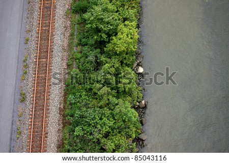 Bird\'s eye view of railroad tracks near the water