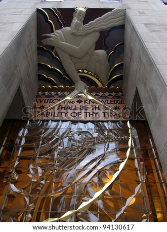 NEW YORK CITY- DECEMBER 15: The 37-foot art deco relief of Wisdom, shown on December 15, 2011 at the entrance of 30 Rockefeller Plaza in New York City, was featured on a $1 U.S. postage stamp in 2003