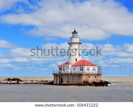 Light House of Chicago in Lake Michigan with cloud and blue sky.