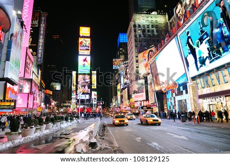 NEW YORK CITY, NY - JAN 30: Times Square is featured with Broadway Theaters and LED signs as a symbol of New York City and the United States. January 30, 2011 in Manhattan, New York City.