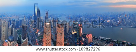 Shanghai aerial view with urban architecture and sunset panorama