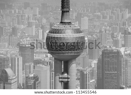 SHANGHAI, CHINA - MAY 28: Oriental Pearl Tower over river on May 28, 2012 in Shanghai, China. The tower was the tallest structure in China excluding Taiwan from 1994-2007 and the landmark of Shanghai.