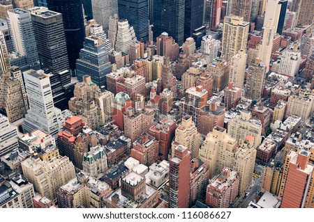 New York City Manhattan Street Aerial View With Skyscrapers, Pedestrian And Busy Traffic.