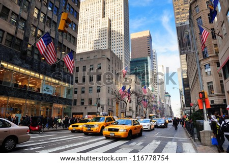 New York City, Ny - Dec 30: Busy Traffic On Street On December 30, 2011 In New York City. Fifth Avenue Has The World\'S Most Expensive Retail Spaces As The Symbol Of Wealthy New York.
