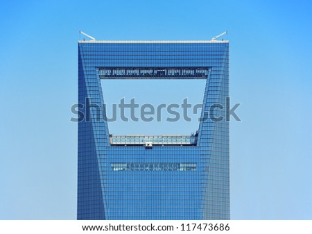 SHANGHAI, CHINA - JUNE 2: Urban Skyscraper with blue sky on JUNE 2, 2012 in Shanghai, China. Shanghai is the largest city by population in the world with 23 million as in 2010 and is still growing.