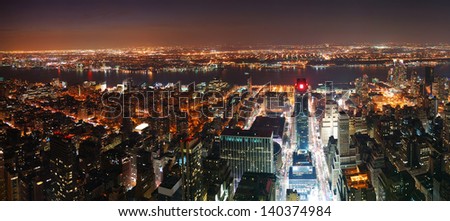 New York City Manhattan skyline aerial view panorama at sunset with skyscrapers and street.