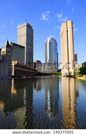 Christian Science Plaza in midtown Boston with urban city view and water reflection.