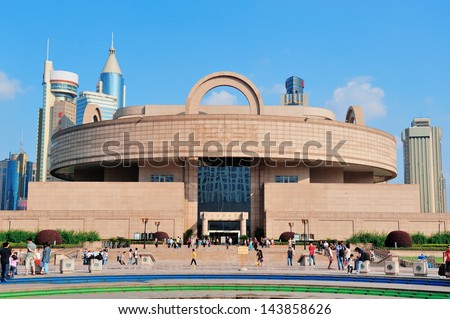 SHANGHAI, CHINA - JUNE 2: Shanghai Museum in People\'s Square on JUNE 2, 2012 in Shanghai, China. Established in 1952 and with 120k collections, it is one of the earliest and largest museums in China.