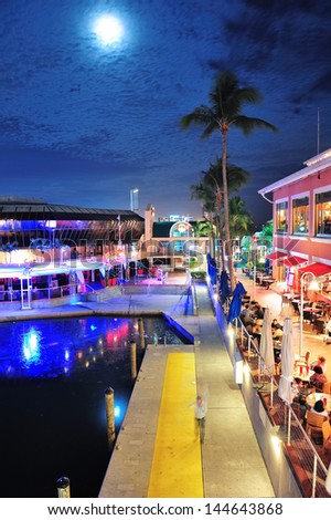 MIAMI, FL - FEB 8: Bayside Marketplace at night on February 8, 2012 in Miami, Florida. It is a festival marketplace and the top entertainment complex in Downtown Miami attracting 15M people annually.