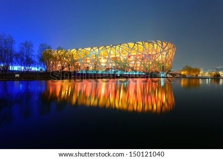 BEIJING, CHINA - APR 7: Beijing National Stadium at night on April 7, 2013 in Beijing, China. The stadium was established for the 2008 Summer Olympics and Paralympics.