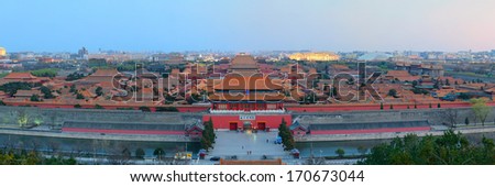 Beijing Forbidden City at dusk with ancient pagoda architecture.
