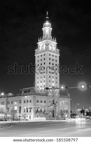 MIAMI, FL - FEB 7: Freedom Tower on street on February 7, 2012 in Miami, Florida. As a memorial to Cuban immigration and Miami city landmark, it is declared as US National Historic Landmark in 2008.