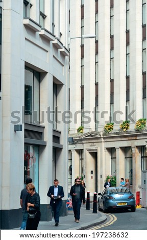 LONDON, UK - SEP 27: Small street with historical buildings on September 27, 2013 in London, UK. London is the world\'s most visited city and the capital of UK.