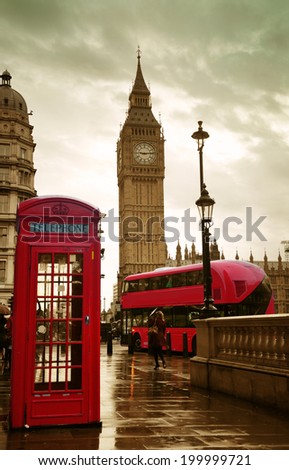 Red telephone box and Big Ben in Westminster in London.