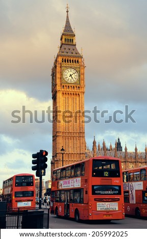 LONDON, UK - SEP 27: Street view with Big Ben and red bus on September 27, 2013 in London, UK. London is the world\'s most visited city and the capital of UK.