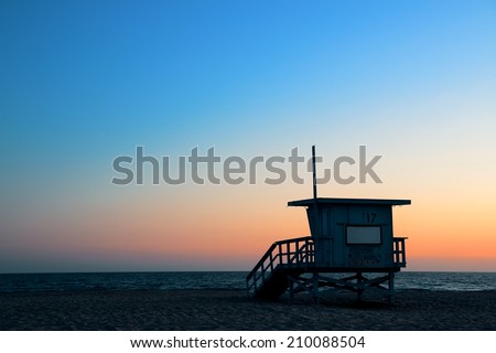 Santa Monica beach safeguard tower at sunset in Los Angeles