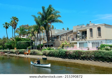 Los Angeles, CA - MAY 18: Venice Canals Walkway with boat on mountain on May 18, 2014 in Los Angeles. Los Angeles is the second-most populous city after New York in USA.