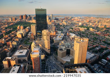 Urban city aerial view. Boston aerial view with skyscrapers at sunset with city downtown skyline.