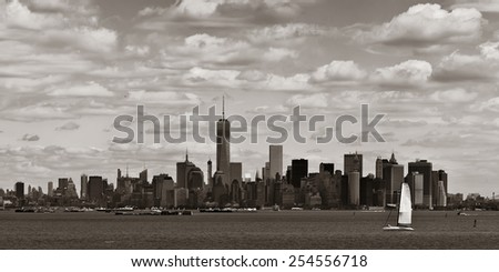 Manhattan downtown skyline with urban skyscrapers and cloud.