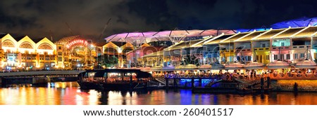 SINGAPORE - APR 5: Clarke Quay at night with street view and restaurant on April 5, 2013 in Singapore. As a historical riverside quay, it is now the hub of Singaporean nightclubs.