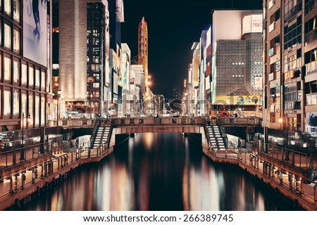 OSAKA, JAPAN - MAY 11: Dotonbori business street at night on May 11, 2013 in Osaka. With nearly 19 million inhabitants, Osaka is the second largest metropolitan area in Japan after Tokyo.