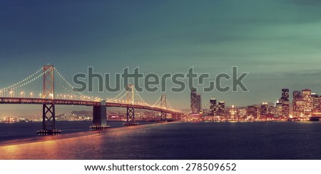 San Francisco city skyline panorama with urban architectures at night.
