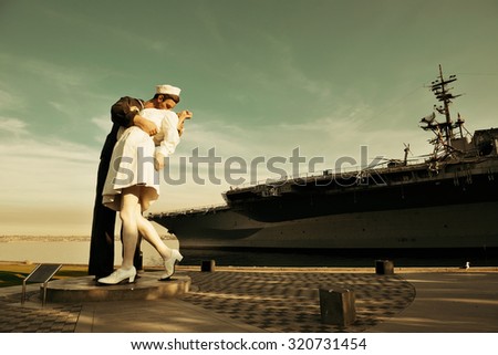 San Diego, CA - MAY 18: Unconditional Surrender sculpture at sea port on May 18, 2014 in San Diego. By Seward Johnson, the statue resembles the photograph of V day in Times Square