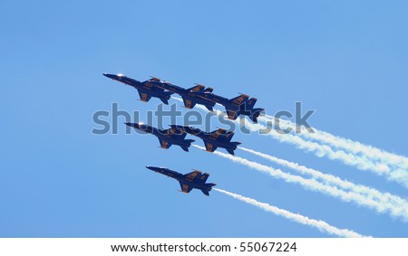 JONES BEACH - MAY 30: US Navy Blue Angels Delta Formation on Jones Beach Air Show on May 30, 2010 in Jones Beach, New York.
