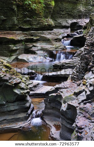 creek in mountain with rocks and stream in Watkins Glen state park in New York State