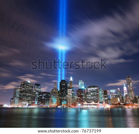 NEW YORK CITY, NY - SEP 11: Light beams are lit at the site in memory of World Trade Center destroyed on September 11. September 11, 2010 in Manhattan, New York City.