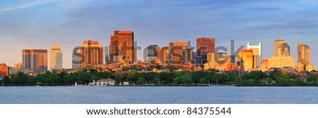 Boston Charles River sunset panorama with urban skyline and skyscrapers