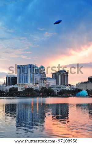 Orlando Lake Eola sunset with urban architecture skyline and colorful cloud