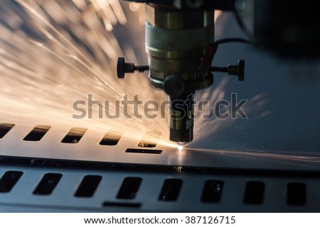 Process of industrial laser cutting of sheet metal