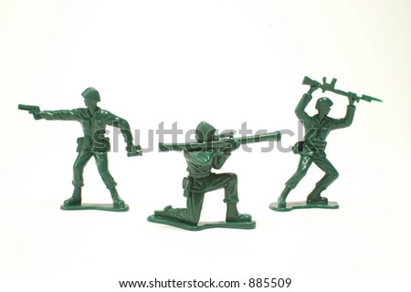 Three toy soldiers on a white background