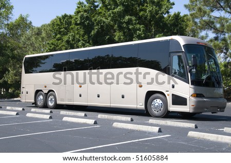 New modern bus with tinted windows waiting for passengers