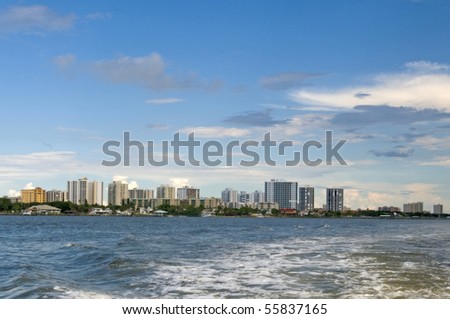 South Daytona skyline showing numerous condo high rise building from a water craft
