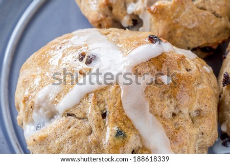 Close up of hot cross buns.  A special food baked to celebrate the holiday of Easter.