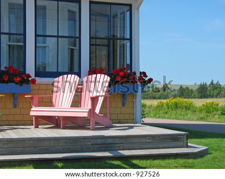 Pink deck chairs on the Inn\'s porch
