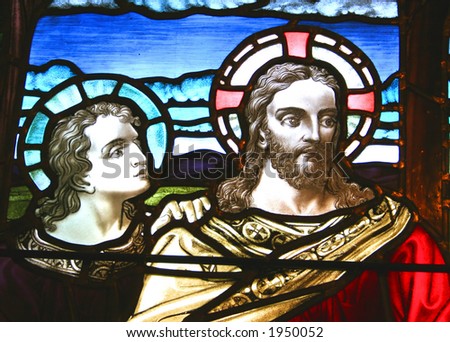 Stained glass pictorial of Jesus and a Disciple.