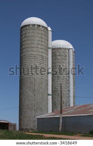 Two silos on a farm in rural Prince Edward Island.