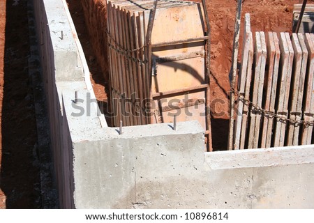 A view of a portion of a new house foundation and the forms that were used to construct it.