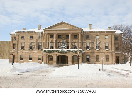 Christmas decorations and lots of snow on Province House in Charlottetown, Prince Edward Island, Canada.