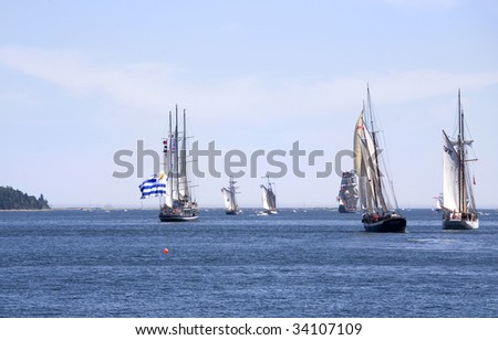 HALIFAX, NOVA SCOTIA - JULY 20: The tall ships sail out of Halifax Harbour during the sailpast of the Nova Scotia Tall Ships Festival, July 20, 2009.