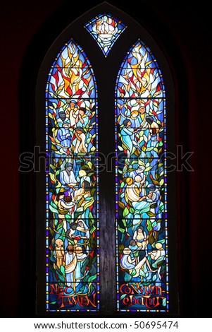 Religious stained glass depicting stories from the Bible.