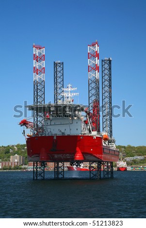 Ocean going oil rig in Halifax Harbor, Nova Scotia, Canada.  Dartmouth can be seen along the shoreline.