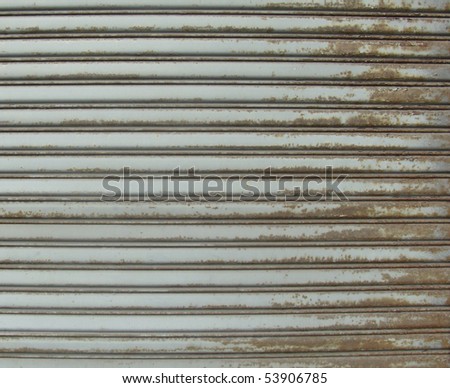 rusty metal store roller shutter