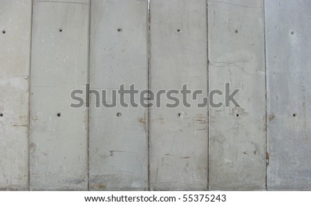 ranked ranged dirty worn industrial large vertical concrete slabs