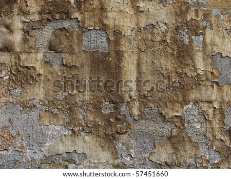 worn painted gray brown wall with paint blathering and leak drip
